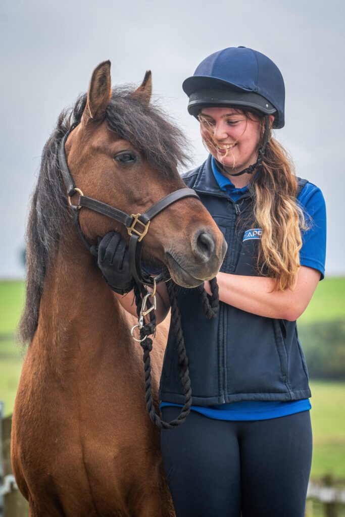Images shows Pony Treacle and Equine Care Officer Lauren
